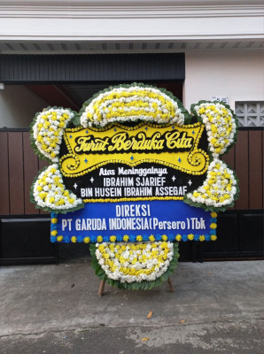 Papan Bunga Duka di Airgaram
