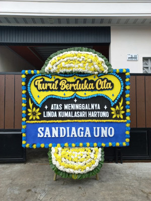 Papan Bunga Duka di Airgaram
